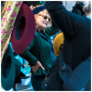 dancing hat seller